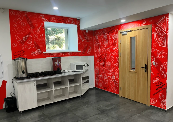 Red Coca-Cola branded office interior
